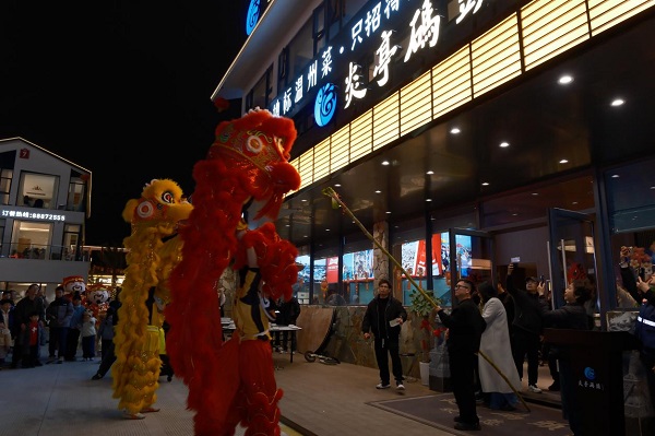 “龙腾绿轴财运到 狮舞商圈福气来”惠美社区民俗暖经济活动